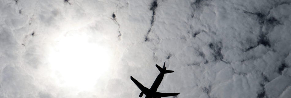 Plane Flying Overhead. Daylight Photography.